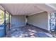 A spacious carport area with painted siding providing covered parking or outdoor storage at 1556 Larry St, North Charleston, SC 29405