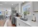 Bright kitchen featuring stainless steel appliances, white countertops, and hardwood floors at 17 Anita Dr, Charleston, SC 29407