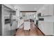 Modern kitchen with white cabinets, stainless steel appliances and an island at 17 Anita Dr, Charleston, SC 29407