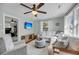 Bright living room boasts a comfortable sectional sofa, ceiling fan, and streaming tv at 17 Anita Dr, Charleston, SC 29407