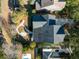 Gorgeous aerial view of the property showing backyard space, roof, landscaping, driveway, and surrounding neighborhood at 184 Scott St, Daniel Island, SC 29492