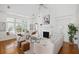 Spacious living room with a fireplace, soaring ceilings, and comfortable seating at 184 Scott St, Daniel Island, SC 29492