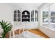 Stylish office with custom built-in shelving, hardwood floors, and bright natural light at 184 Scott St, Daniel Island, SC 29492