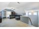 Comfortable bonus room with stairs, sectional, ceiling fan and good natural light at 1945 Hubbell Dr, Mount Pleasant, SC 29466