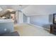 Upstairs bonus room area includes a TV, storage and bathroom access at 1945 Hubbell Dr, Mount Pleasant, SC 29466