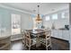 Bright dining area with modern chandelier and neutral color palette at 1945 Hubbell Dr, Mount Pleasant, SC 29466