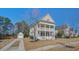 Beautiful two-story home with a double front porch and detached garage at 1945 Hubbell Dr, Mount Pleasant, SC 29466