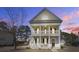 Exterior elevation of a two-story home with covered porches and a nice yard at 1945 Hubbell Dr, Mount Pleasant, SC 29466
