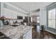 Beautiful kitchen with granite counters, stainless appliances, and seamless flow to dining area at 1945 Hubbell Dr, Mount Pleasant, SC 29466