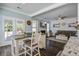 Open concept living space featuring a fireplace and access to outdoor space at 1945 Hubbell Dr, Mount Pleasant, SC 29466