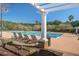 Community pool area with lounge chairs and a pool-side pergola for shade at 1945 Hubbell Dr, Mount Pleasant, SC 29466