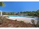 Resort-style community pool featuring ample lounging space, a covered pavilion and mature landscaping at 1945 Hubbell Dr, Mount Pleasant, SC 29466