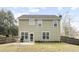 This home has a back exterior featuring a well-maintained yard and a small patio at 2005 Nitsa St, Johns Island, SC 29455