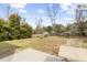 Large, fenced backyard featuring a patio, a fire pit and ample space for outdoor enjoyment at 2005 Nitsa St, Johns Island, SC 29455