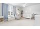 Charming Bedroom room with crib, soft blue accents, and natural light at 2005 Nitsa St, Johns Island, SC 29455