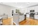 Bright kitchen with stainless appliances, white cabinetry and granite counters at 2005 Nitsa St, Johns Island, SC 29455