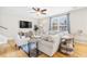 Comfortable living room with hardwood floors and ample seating, great for relaxation and entertaining guests at 2005 Nitsa St, Johns Island, SC 29455