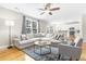 Spacious living room with hardwood floors and comfortable seating, perfect for relaxing and entertaining at 2005 Nitsa St, Johns Island, SC 29455
