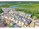 Aerial view of a neighborhood with colorful houses and a waterfront at 2014 Codorus Ln, Hanahan, SC 29410