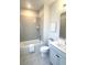 Bathroom featuring a tiled bathtub, a toilet, and vanity with sink at 2014 Codorus Ln, Hanahan, SC 29410