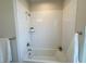 Bathroom featuring a white tiled shower and white bathtub at 2014 Codorus Ln, Hanahan, SC 29410