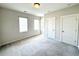 Spacious bedroom with lots of light and plush neutral carpeting at 2014 Codorus Ln, Hanahan, SC 29410