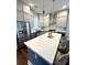 Stylish kitchen island with seating, stainless steel appliances, and modern pendant lighting at 2014 Codorus Ln, Hanahan, SC 29410