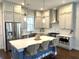 Well-equipped kitchen with white cabinetry, stainless steel appliances, and a functional center island at 2014 Codorus Ln, Hanahan, SC 29410