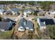 Aerial view of the house and neighborhood, featuring a nearby pond at 2080 Bancroft Ln, Mount Pleasant, SC 29466