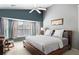 Relaxing bedroom featuring a large bay window, comfortable bed, and vaulted ceiling at 2080 Bancroft Ln, Mount Pleasant, SC 29466