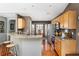 Open kitchen featuring wood cabinets, granite countertops, and modern stainless steel appliances at 2080 Bancroft Ln, Mount Pleasant, SC 29466