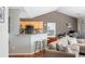 Open living room flows into the kitchen with a breakfast bar and adjacent workspace at 2080 Bancroft Ln, Mount Pleasant, SC 29466
