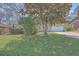 Lovely single-story brick home with a well-manicured lawn and mature shade trees in a peaceful neighborhood at 2529 Otranto Rd, North Charleston, SC 29406