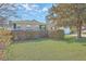 Well-maintained brick home with charming curb appeal, featuring a manicured lawn and mature landscaping at 2529 Otranto Rd, North Charleston, SC 29406