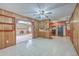 Open concept kitchen with breakfast bar that leads into the living room featuring a fireplace at 2529 Otranto Rd, North Charleston, SC 29406