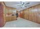 Open kitchen with wood paneling, tile floors and updated appliances at 2529 Otranto Rd, North Charleston, SC 29406