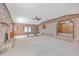 Spacious recreation room with pool table, brick fireplace, and neutral carpet at 2529 Otranto Rd, North Charleston, SC 29406