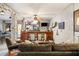 Finished basement with a bar, comfortable seating, and plenty of room for entertaining at 2664 Magnolia Woods Dr, Mount Pleasant, SC 29464