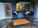 Outdoor bar and seating area with black wicker chairs and a wood coffee table at 2664 Magnolia Woods Dr, Mount Pleasant, SC 29464