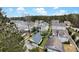 An aerial view of houses with well-maintained lawns and mature trees in a suburban neighborhood at 2876 Rivertowne Pkwy, Mount Pleasant, SC 29466