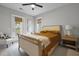 Cozy bedroom featuring a stylish bed and access to an outdoor balcony at 2876 Rivertowne Pkwy, Mount Pleasant, SC 29466