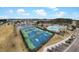An aerial view showing the community's recreational facilities, including tennis and basketball courts, and pool at 2876 Rivertowne Pkwy, Mount Pleasant, SC 29466