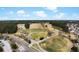 Expansive aerial view of the community golf course and lakes, showcasing picturesque scenery at 2876 Rivertowne Pkwy, Mount Pleasant, SC 29466