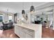 Bright kitchen island with an open layout connecting the dining and living areas at 2876 Rivertowne Pkwy, Mount Pleasant, SC 29466