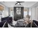 Sophisticated living room featuring a modern fireplace, hardwood floors, and neutral décor at 2876 Rivertowne Pkwy, Mount Pleasant, SC 29466