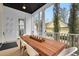 Outdoor dining on a spacious screened porch; perfect for enjoying the outdoors at 2876 Rivertowne Pkwy, Mount Pleasant, SC 29466
