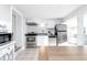 Clean kitchen with stainless steel appliances and bright white cabinets at 3 25Th Ave, Isle of Palms, SC 29451
