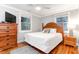 Serene bedroom featuring hardwood floors, natural light, and light neutral decor at 3 25Th Ave, Isle of Palms, SC 29451