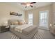 Sun-filled main bedroom featuring neutral tones, modern furniture, and windows that provide ample natural light at 3575 Holmgren St, Mount Pleasant, SC 29466