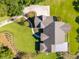 Beautiful aerial shot of house with nice landscaping, long driveway, and manicured lawn at 4105 Gnarled Oaks Ln, Johns Island, SC 29455
